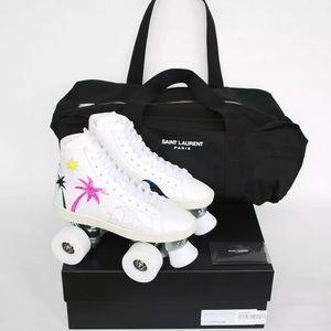 WHITE SAINT LAURENT ROLLER SKATES.